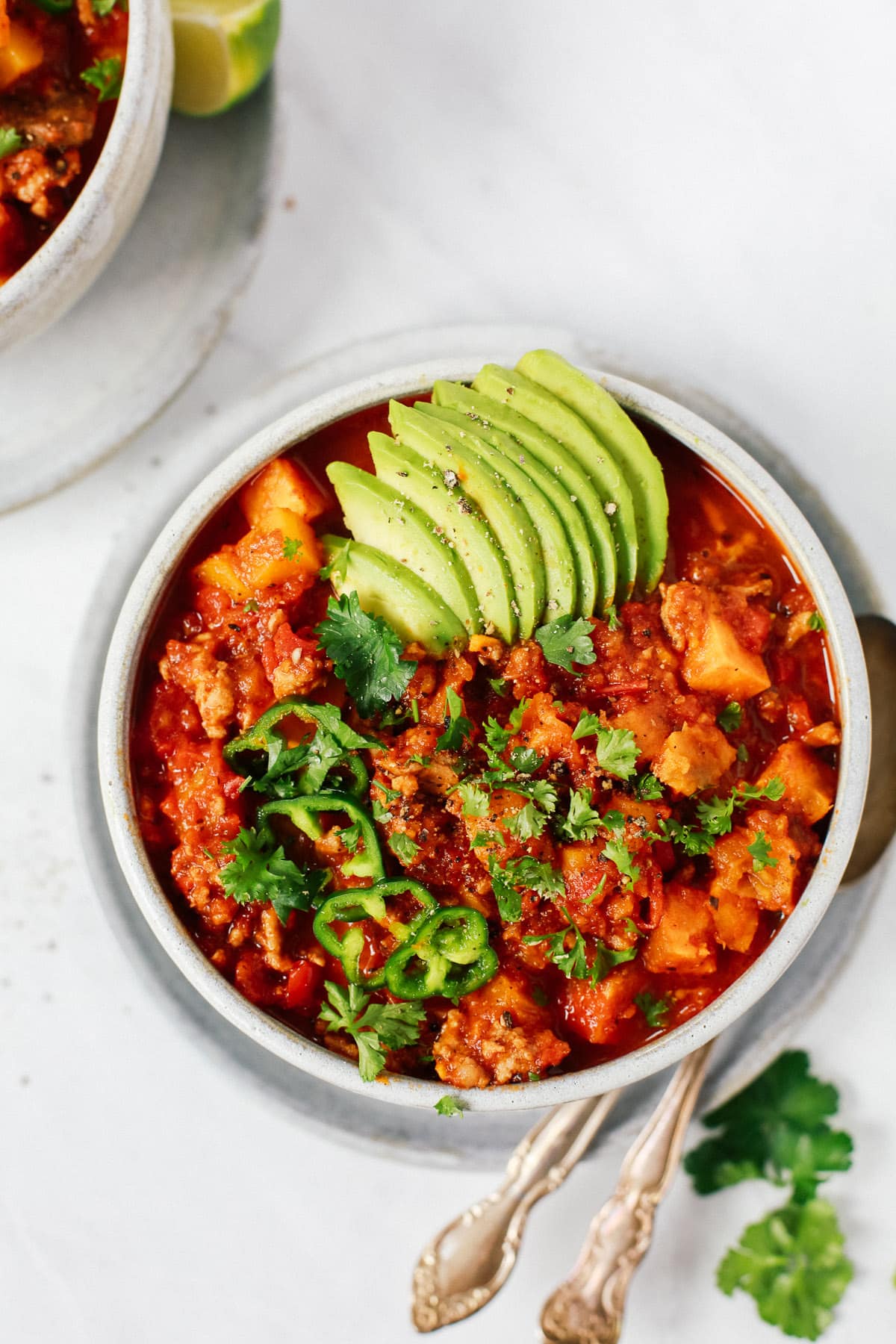 Overhead view of sweet potato chili in a white bowl