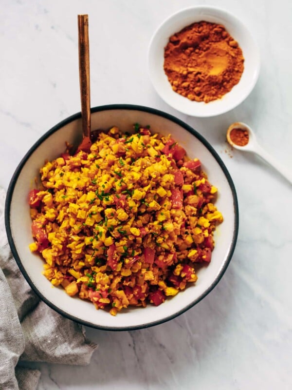 Overhead photo of a bowl of golden cauliflower rice.