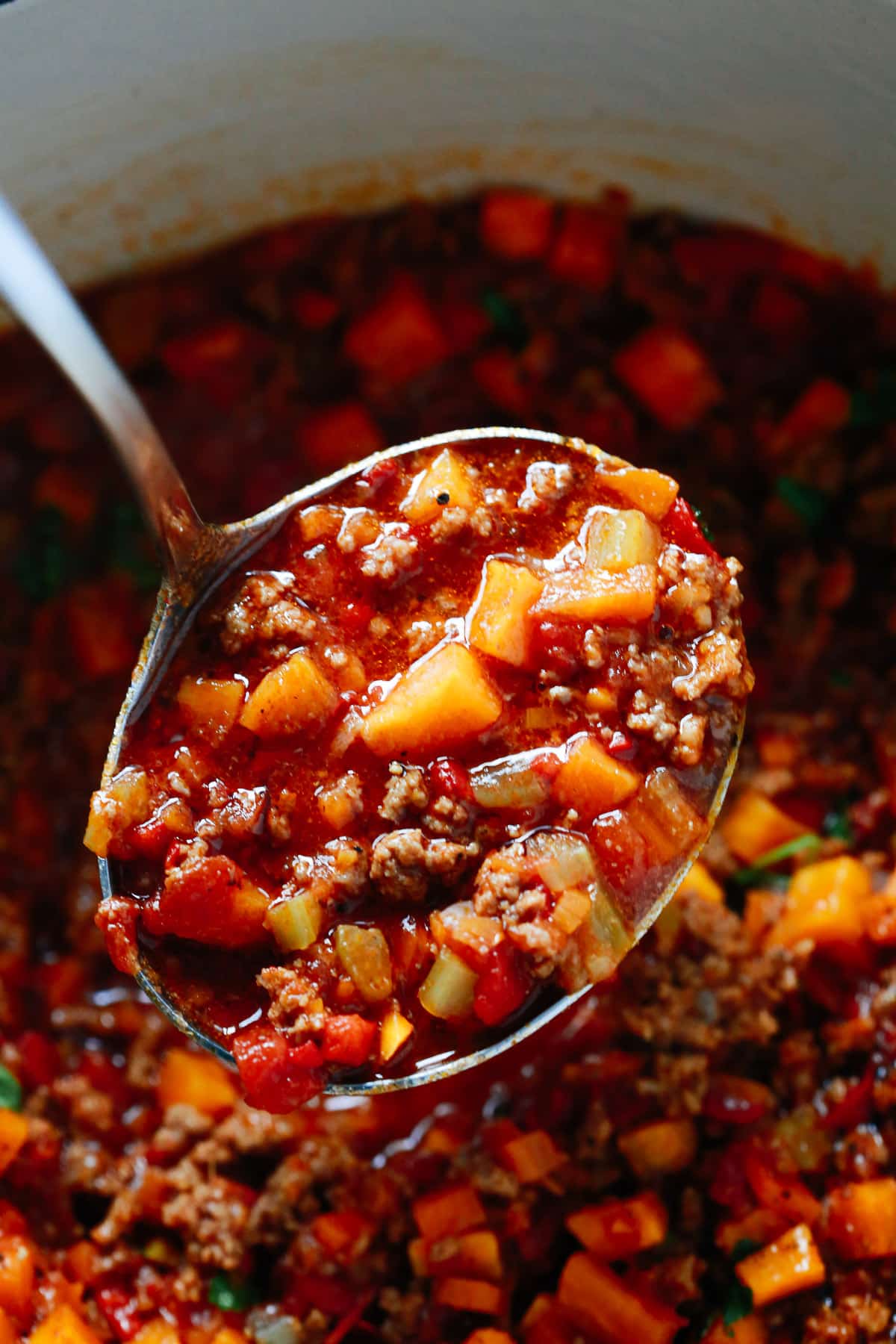 No Bean Whole30 Butternut Squash Chili in a ladle 