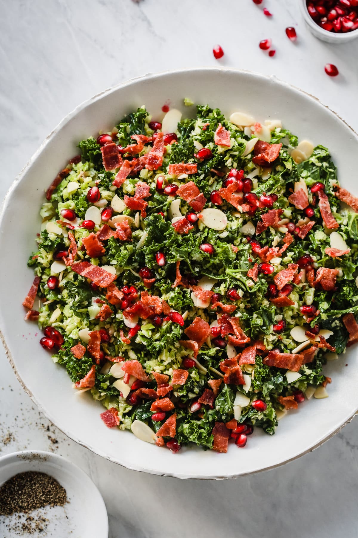 Overhead photo of a plate of shredded Brussels sprout salad.