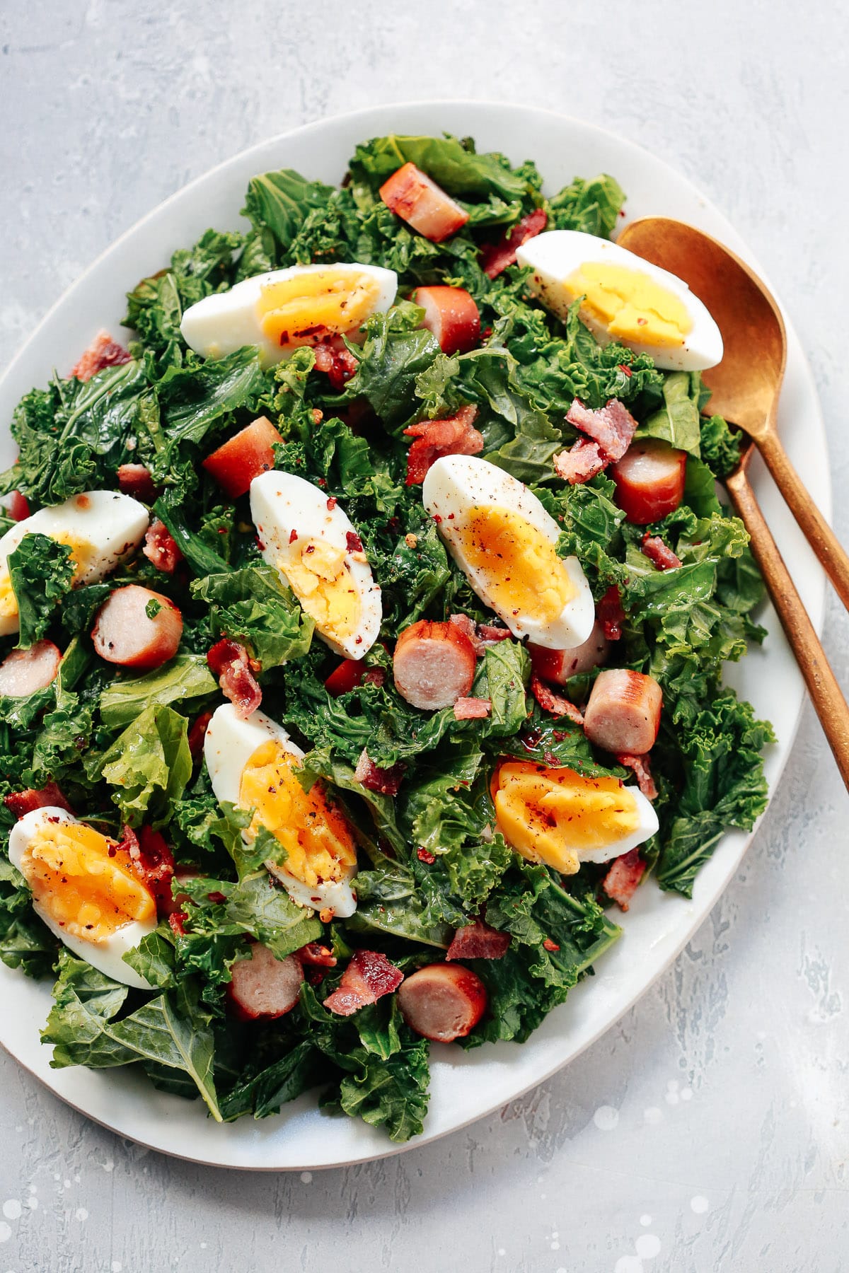 overhead view of Breakfast salad plate with two spoons inside