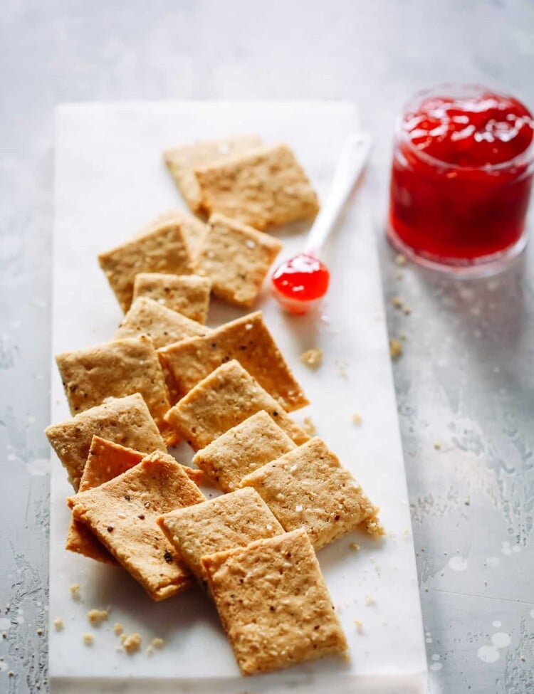 overhead view of Low-Carb Almond Flour Crackers on a marble serving board
