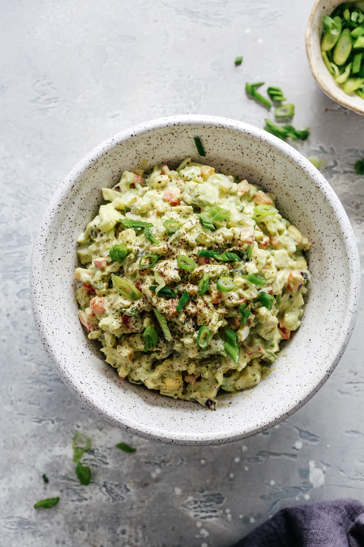 Overhead photo of a bowl of avocado egg salad.