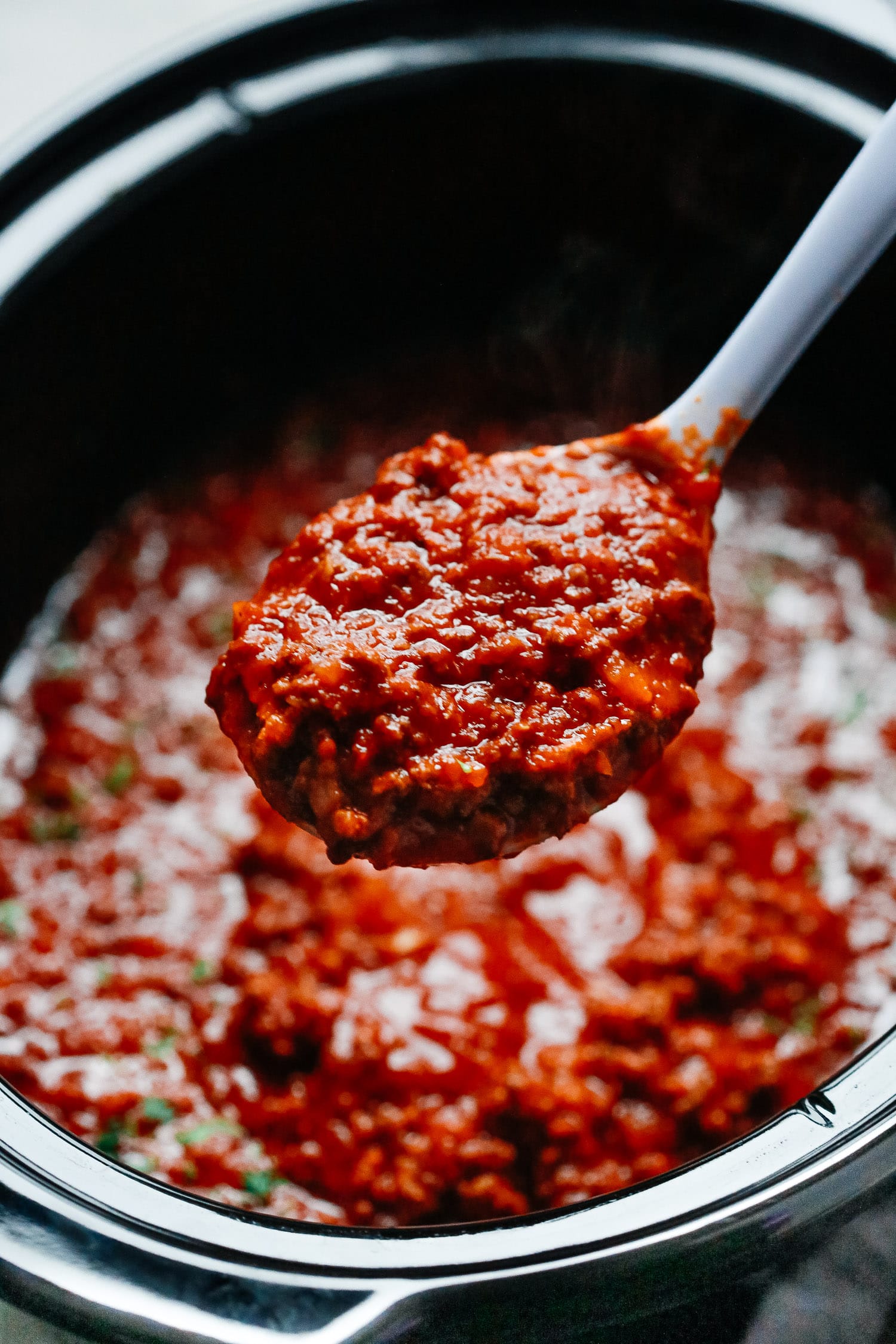 close up of ladder containing meat sauce