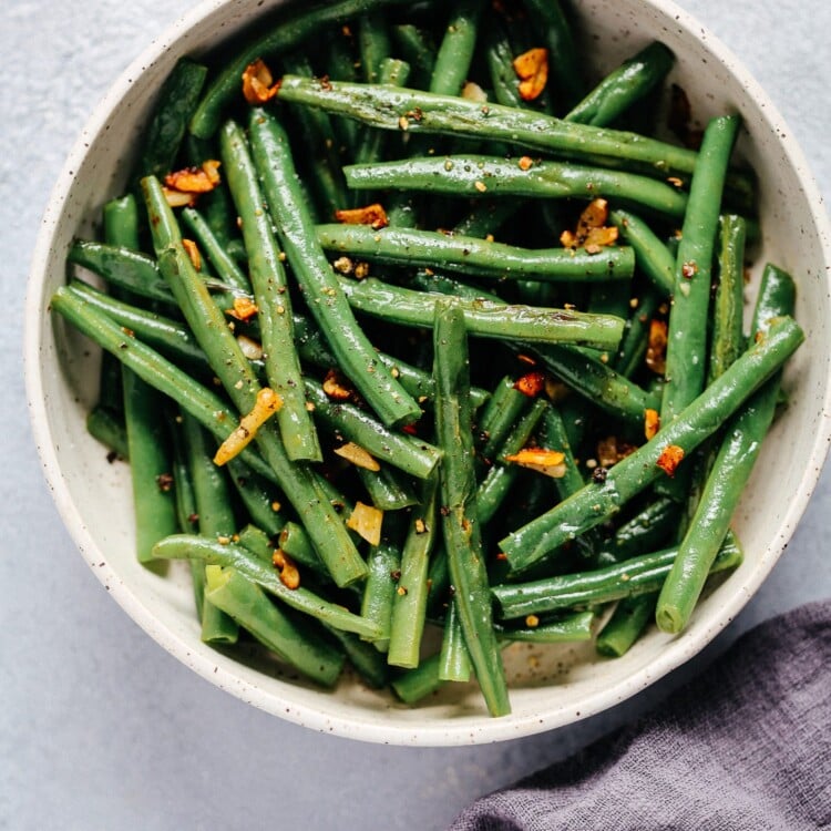 bowl of fresh grean beans with garlic and butter