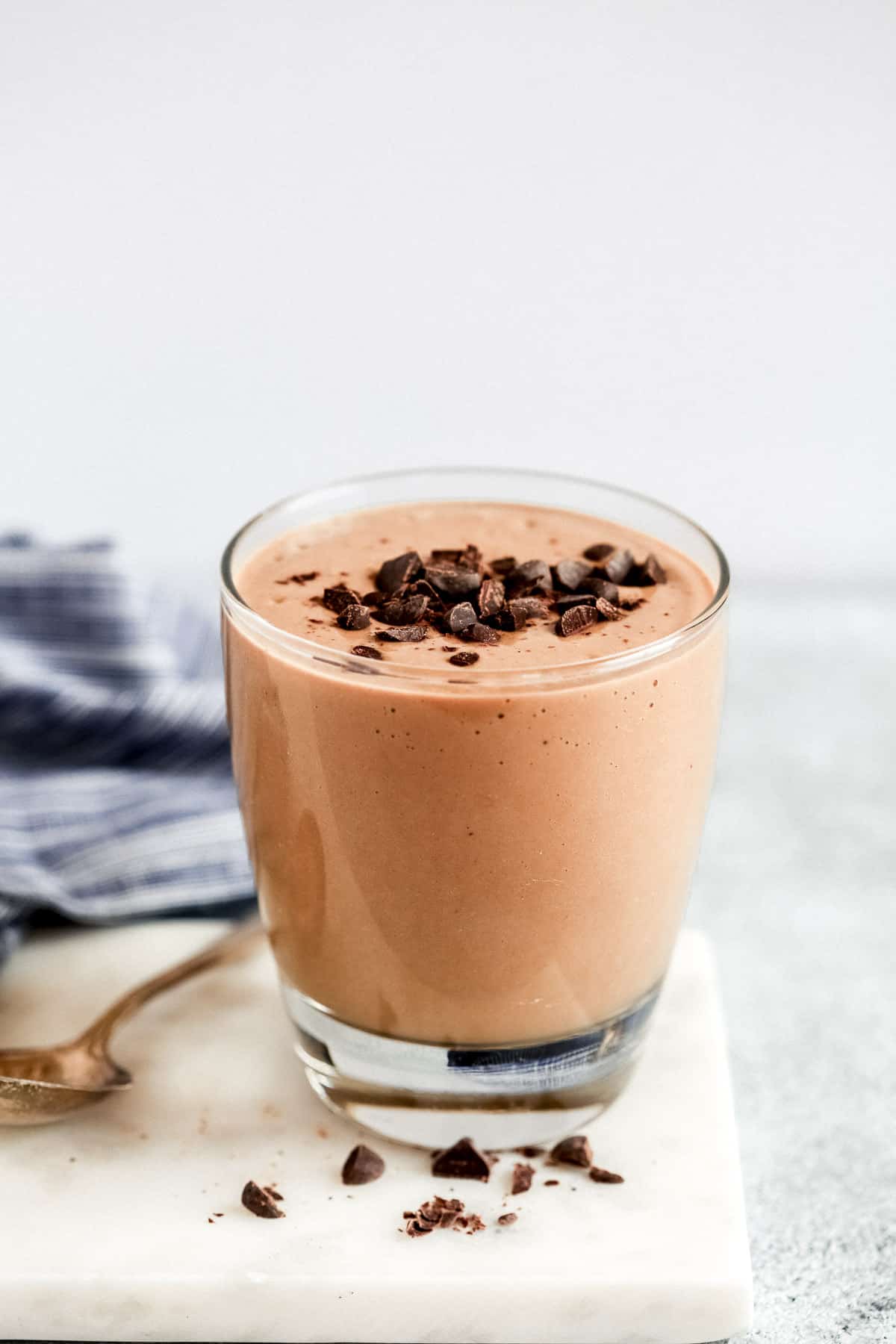 close up of a low carb chocolate smoothie garnished with chocolate chips 