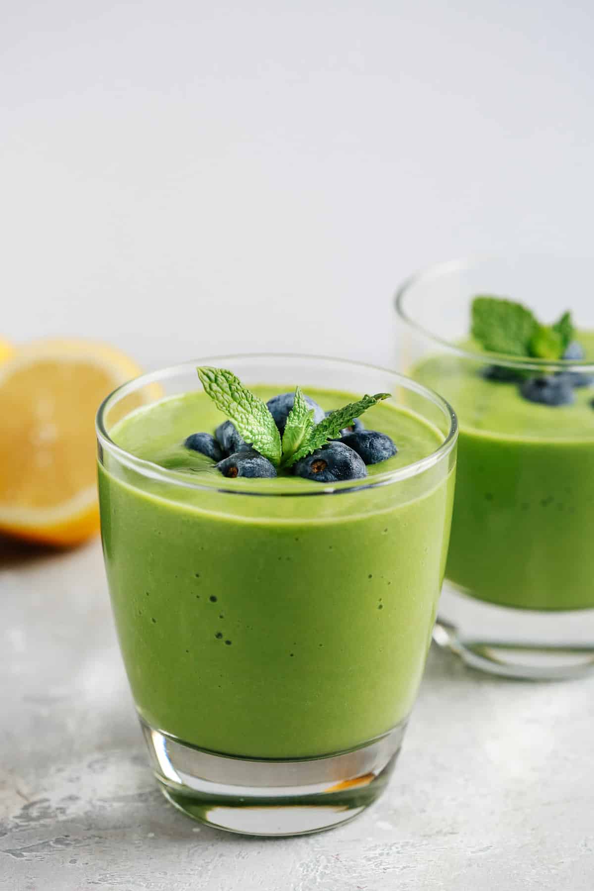 green breakfast smoothie in short juice glass
