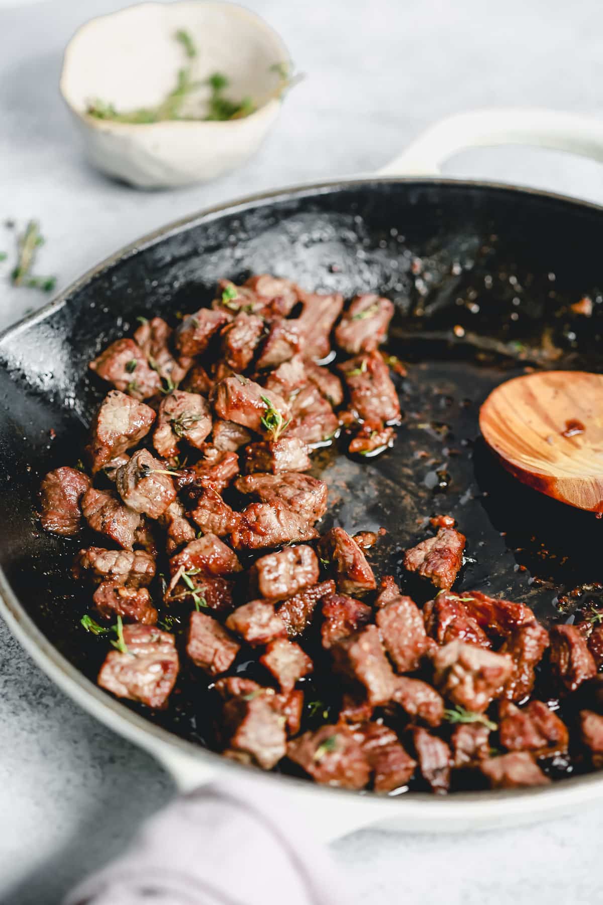 making a skillet steak recipe with garlic butter