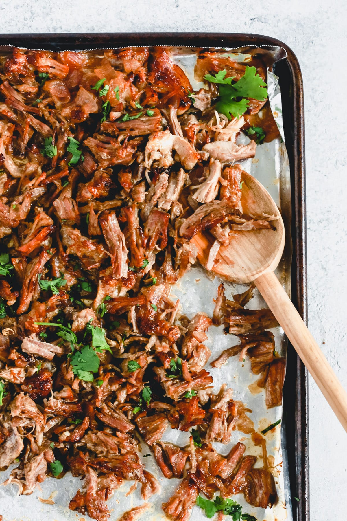 shredded pork carnitas on sheet pan