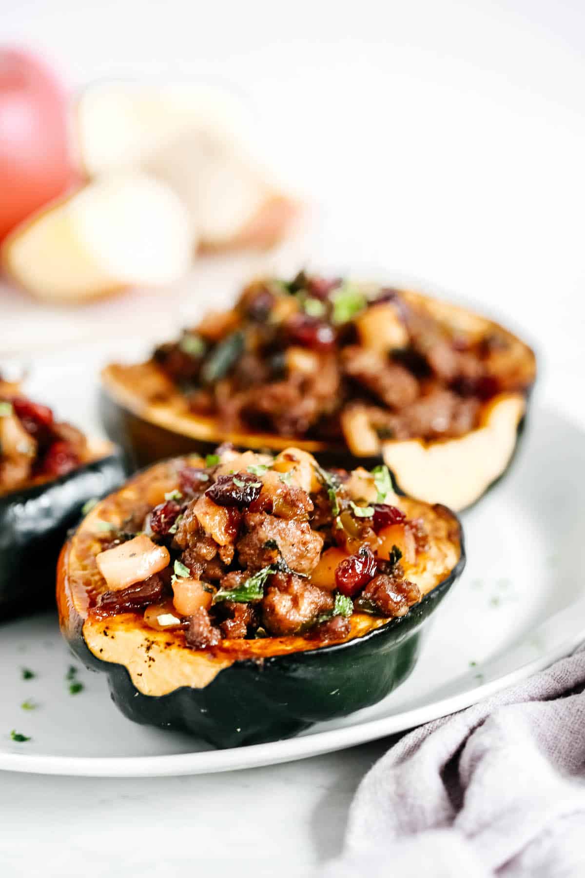 Close up of Sausage Stuffed Acorn Squash. 