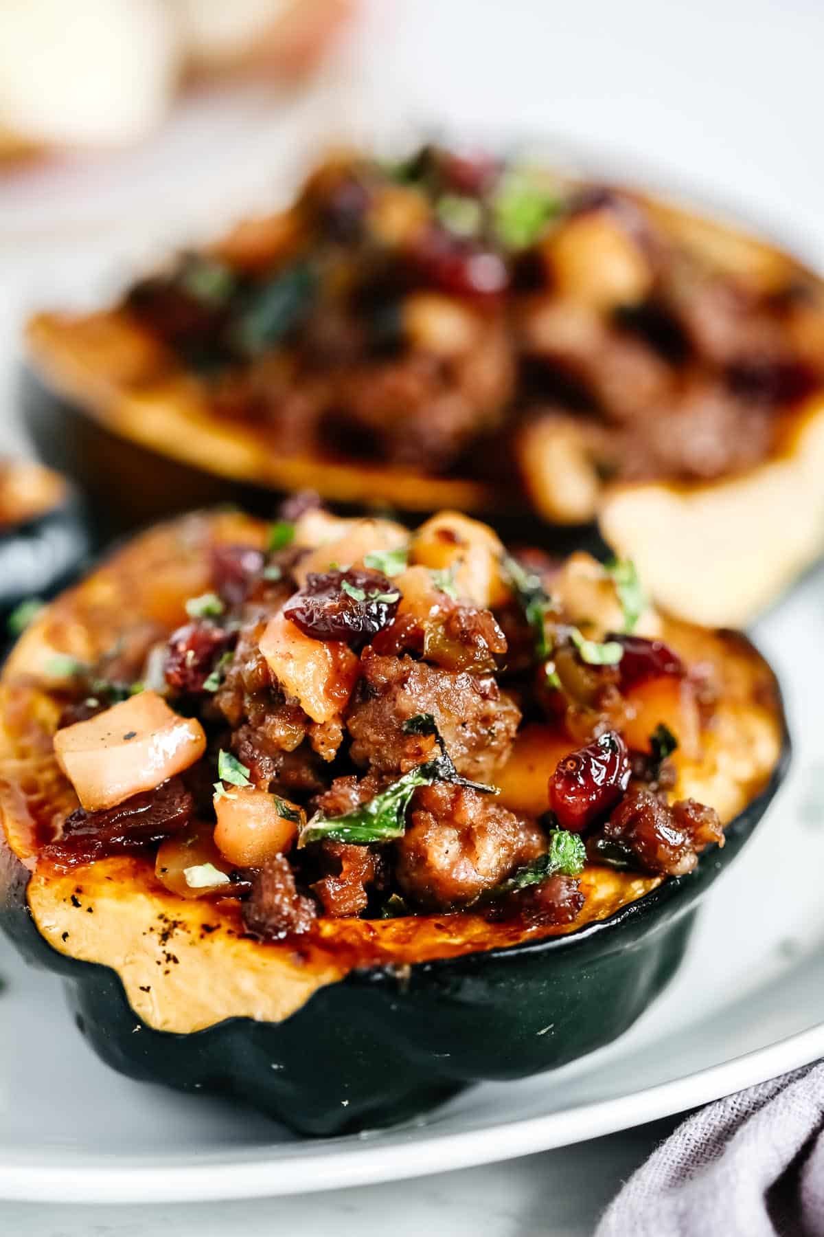 Close up of Sausage Stuffed Acorn Squash. 