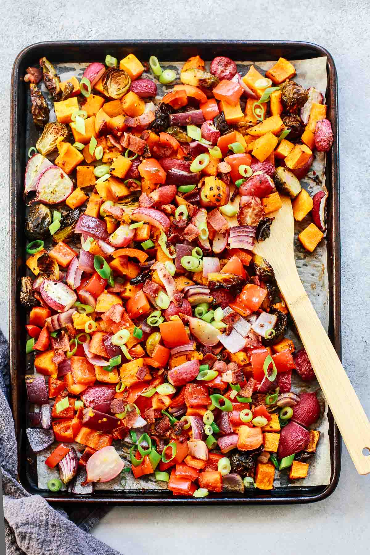 overhead view of roasted vegetables on sheet pan