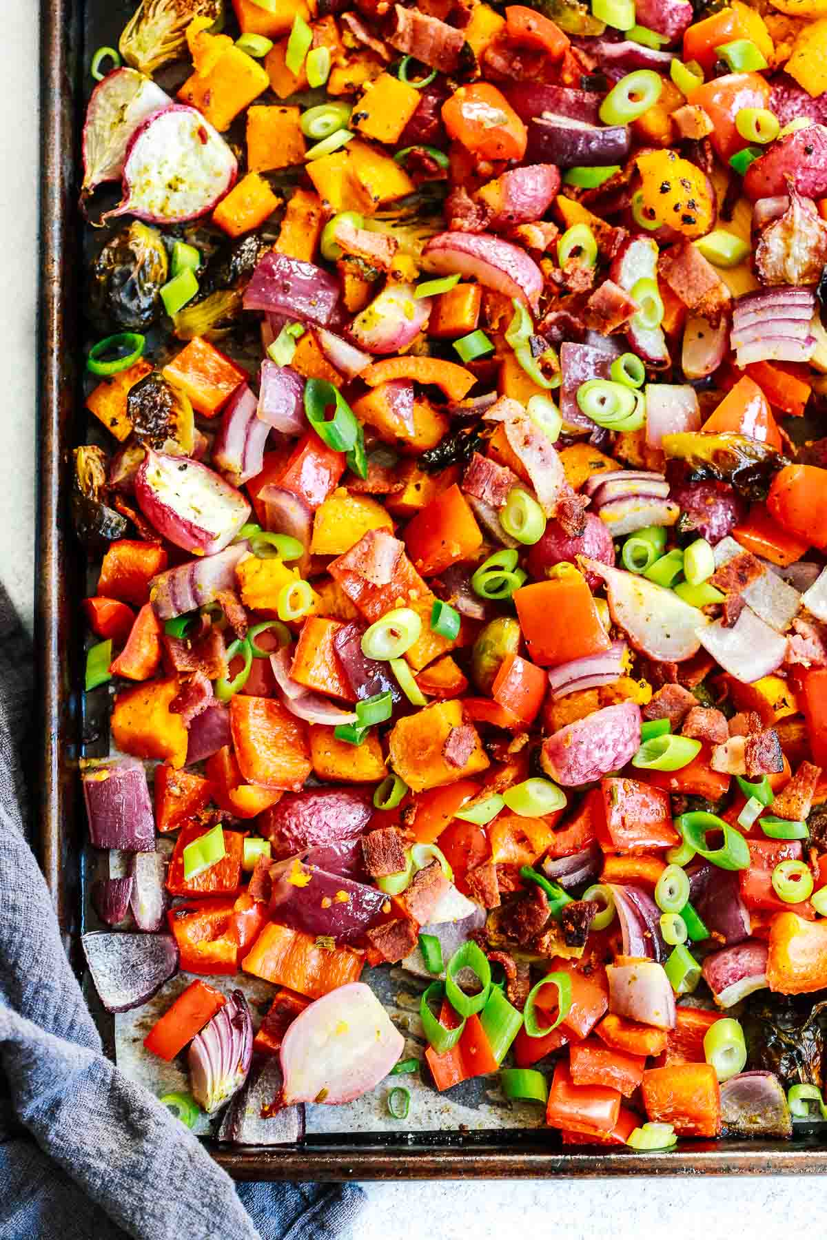 Overhead photo of a sheet pan with roasted vegetables.