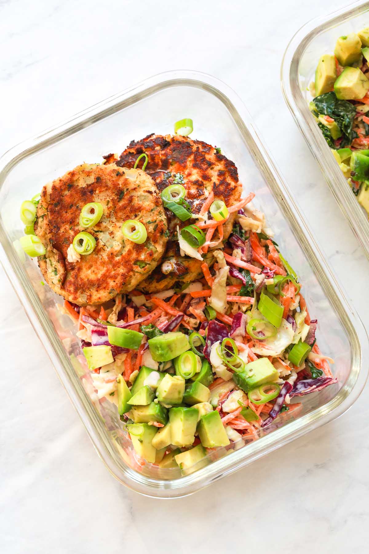 Salmon with coleslaw salad meal prep.