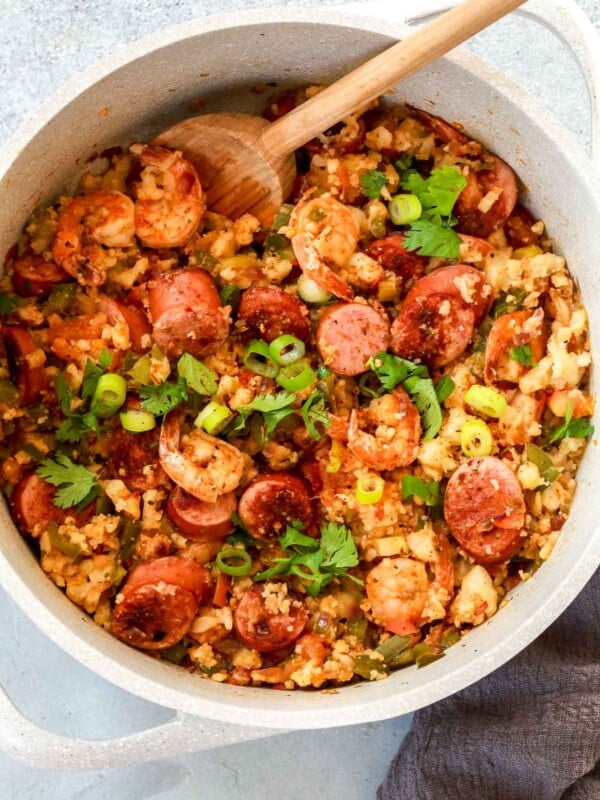 overhead view of a white pot containing whole30 jambalaya