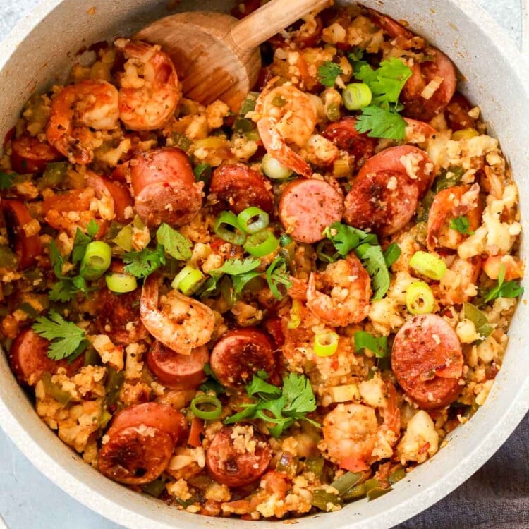 overhead view of a white pot containing whole30 jambalaya