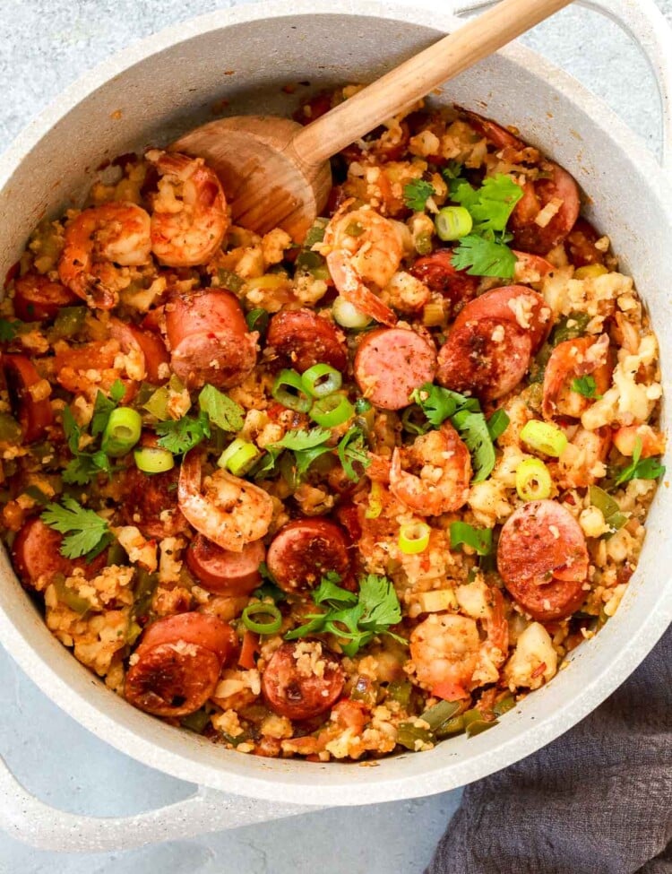 overhead view of a white pot containing whole30 jambalaya