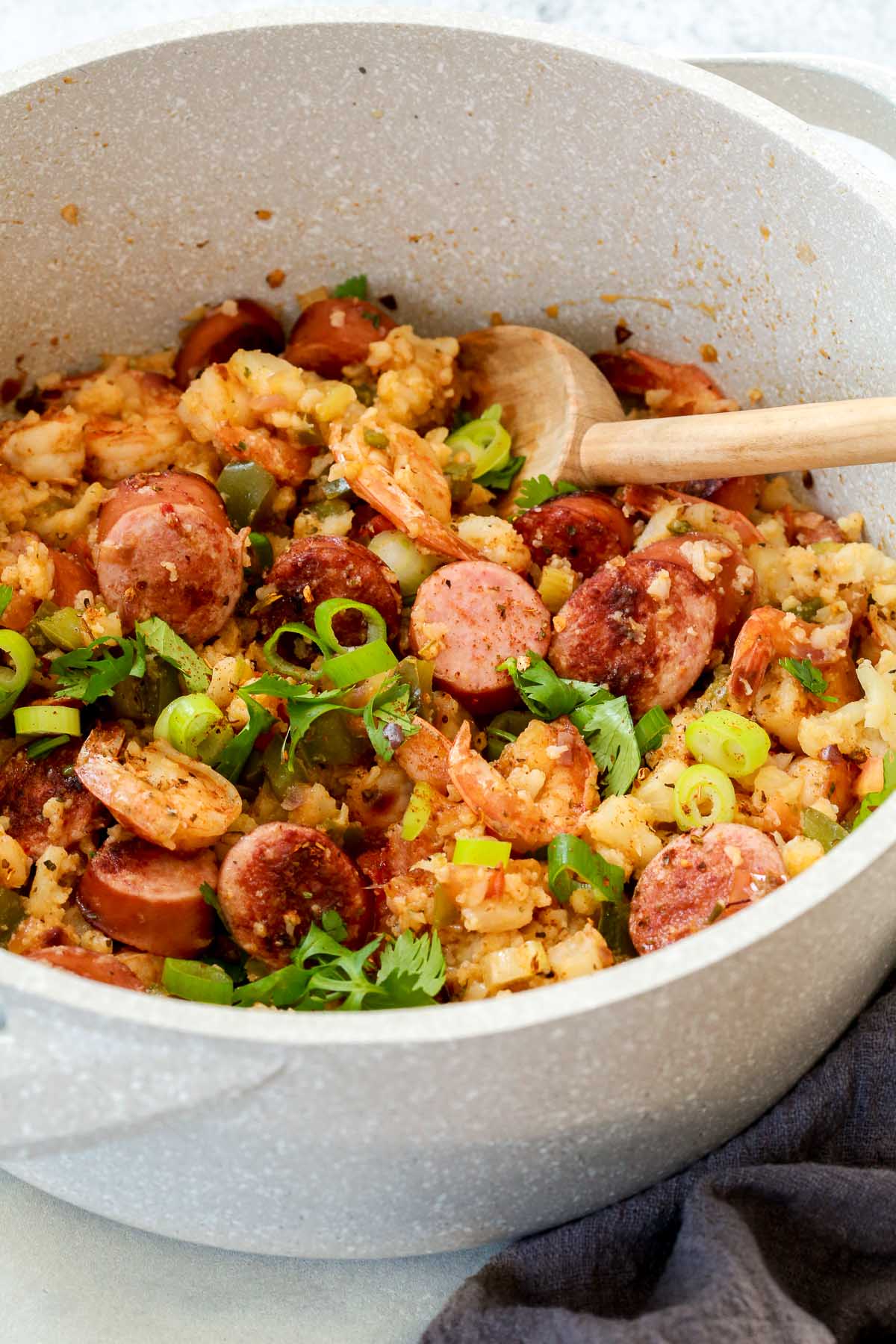 overhead view of a white pot of whole30 jambalaya