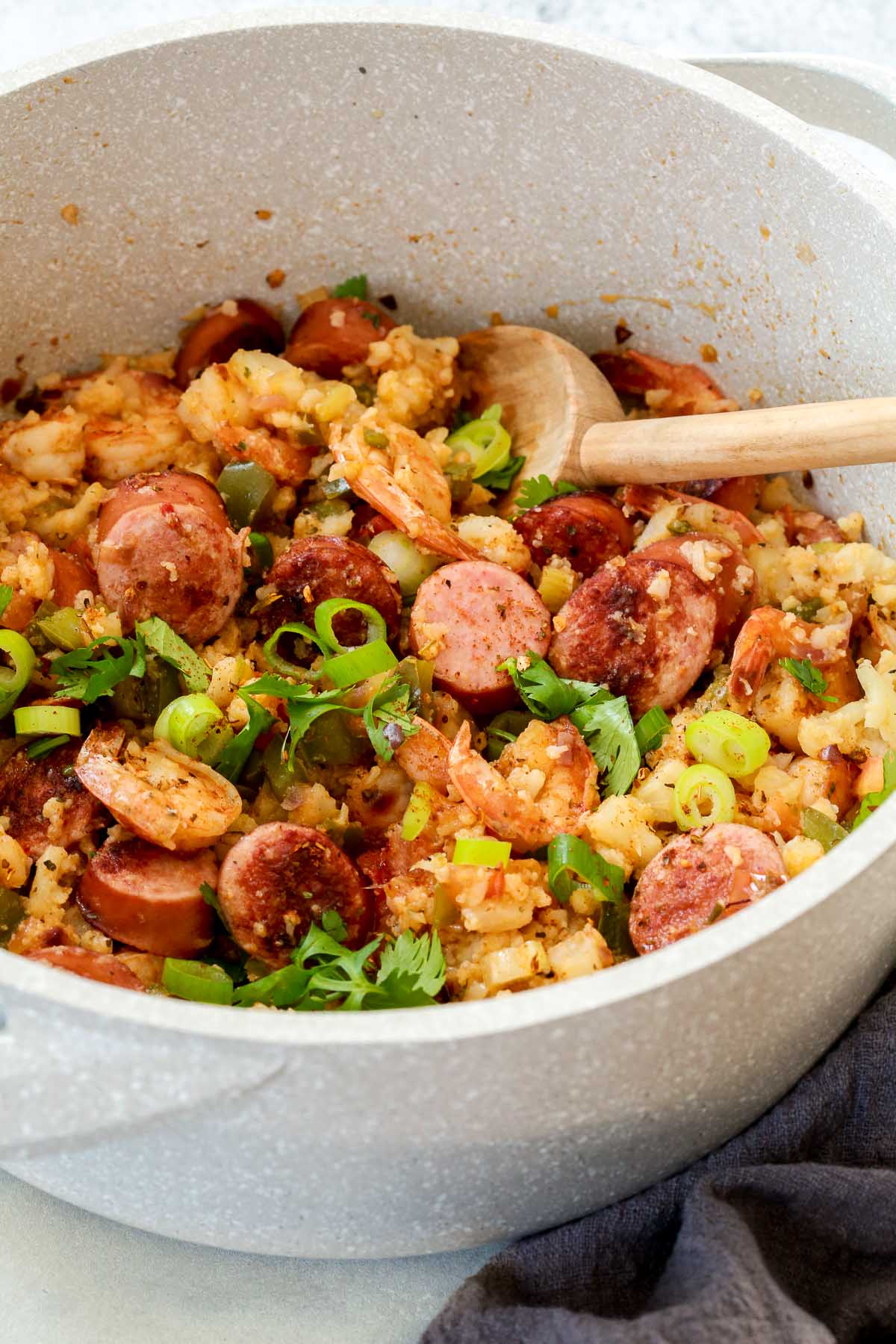 overhead view of a white pot of whole30 jambalaya 