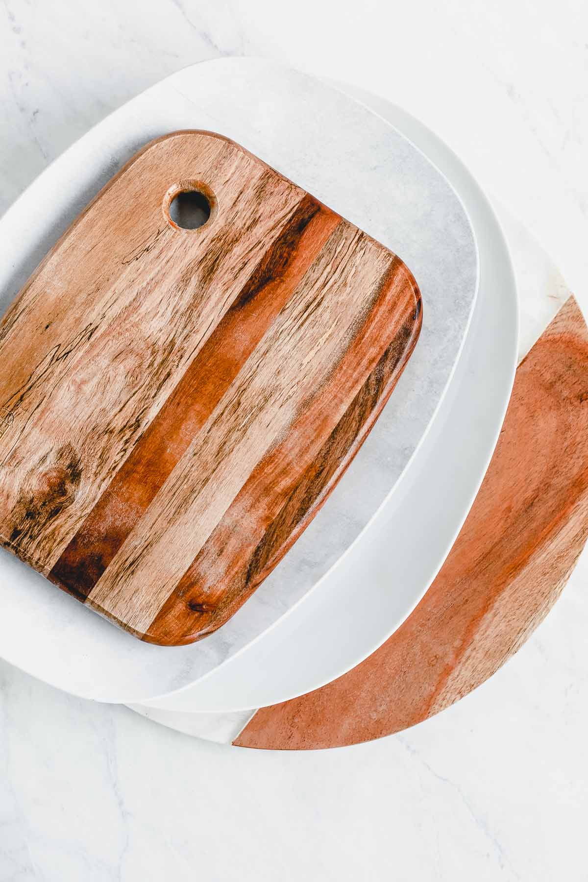 wooden boards and plates to use for a cheese board