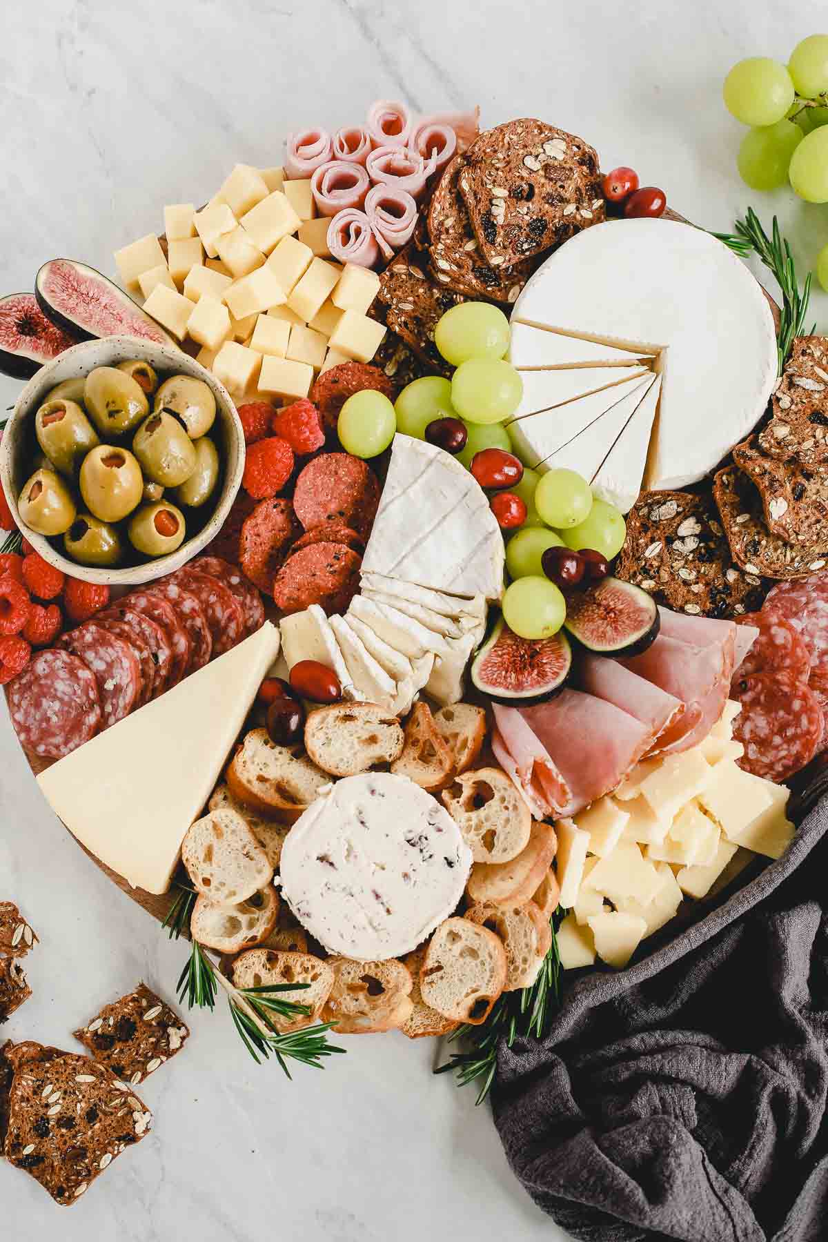 charcuterie board with meats and cheeses