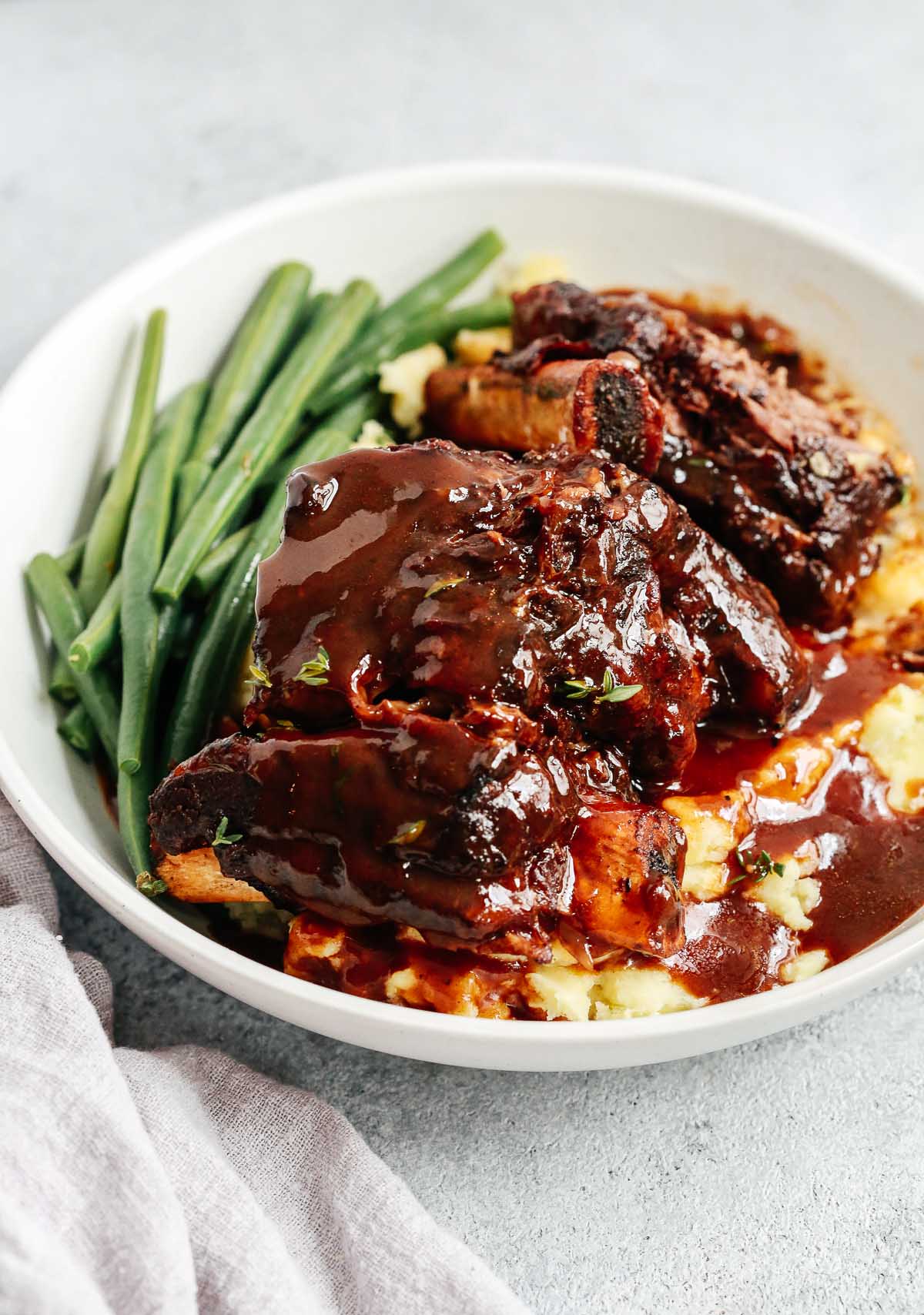 overhead view of a bowl containing Instant pot short ribs