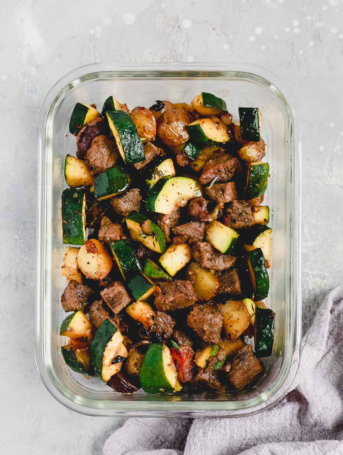 beef and zucchini in a meal prep bowl