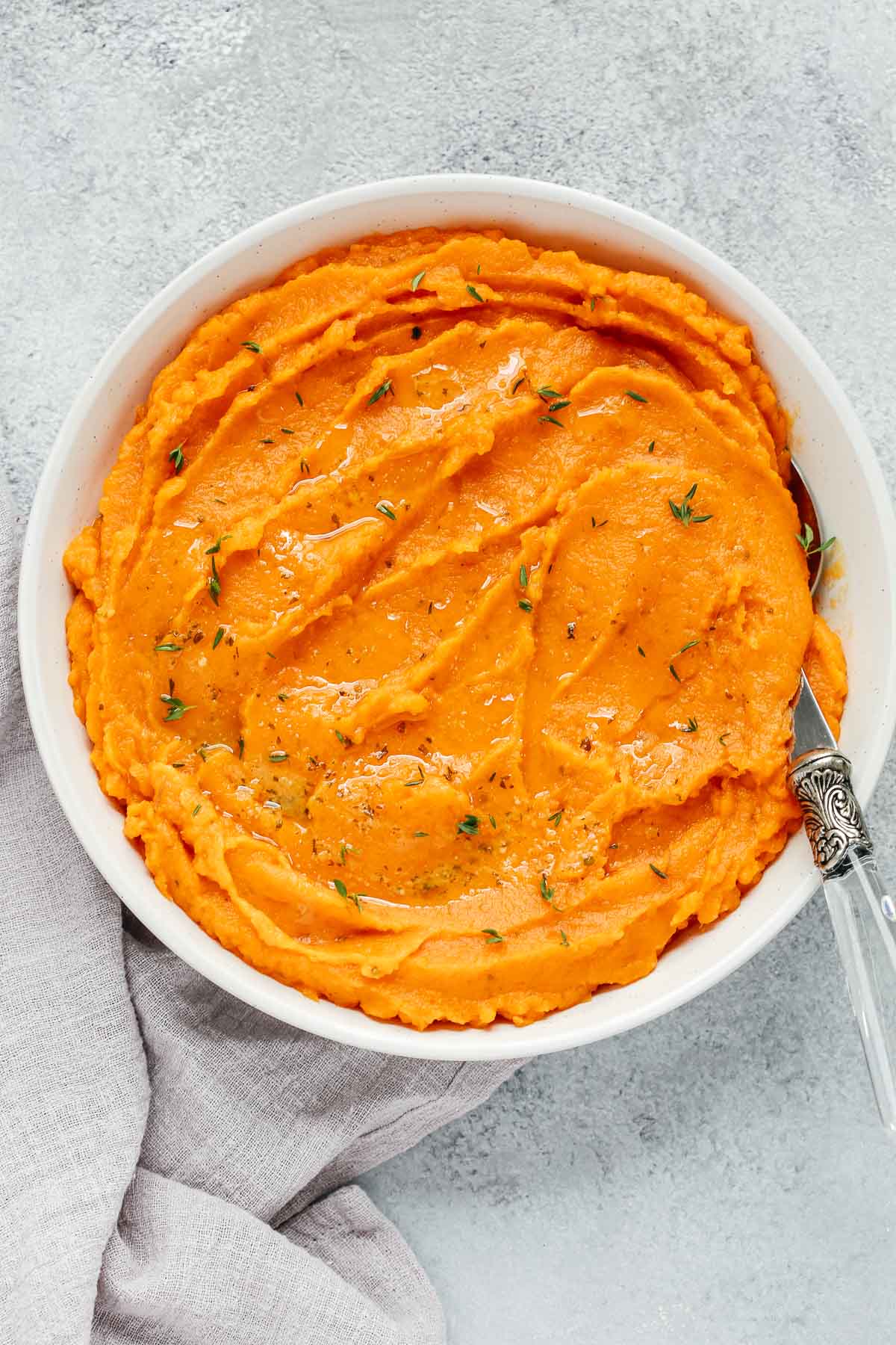 overhead view of a bowl with mashed sweet potatoes