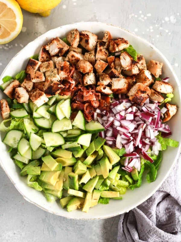 A white bowl of chopped chicken salad.