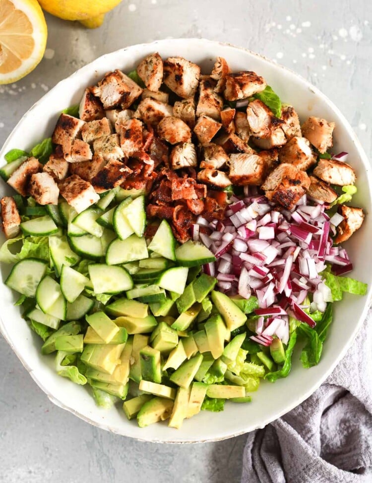 A white bowl of chopped chicken salad.