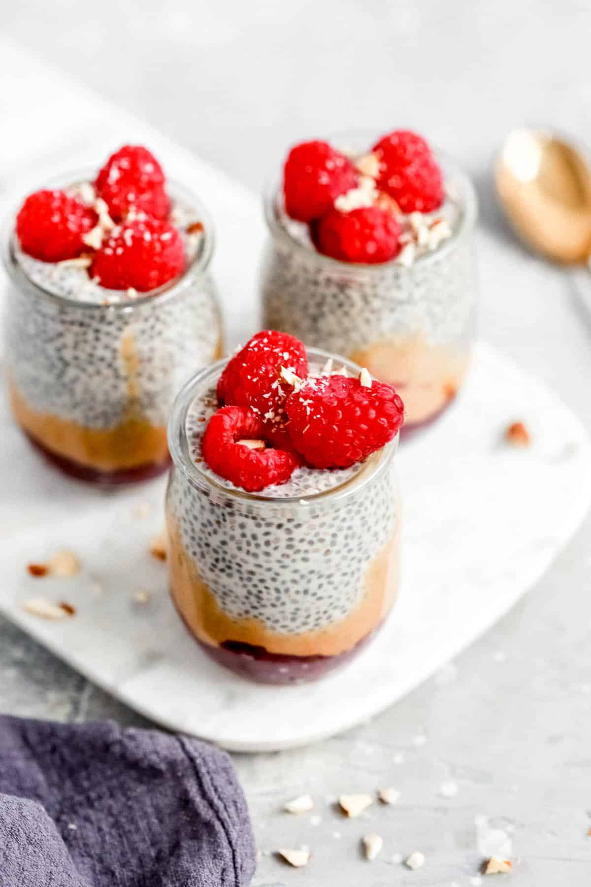 top view of glass jars of chia seed pudding