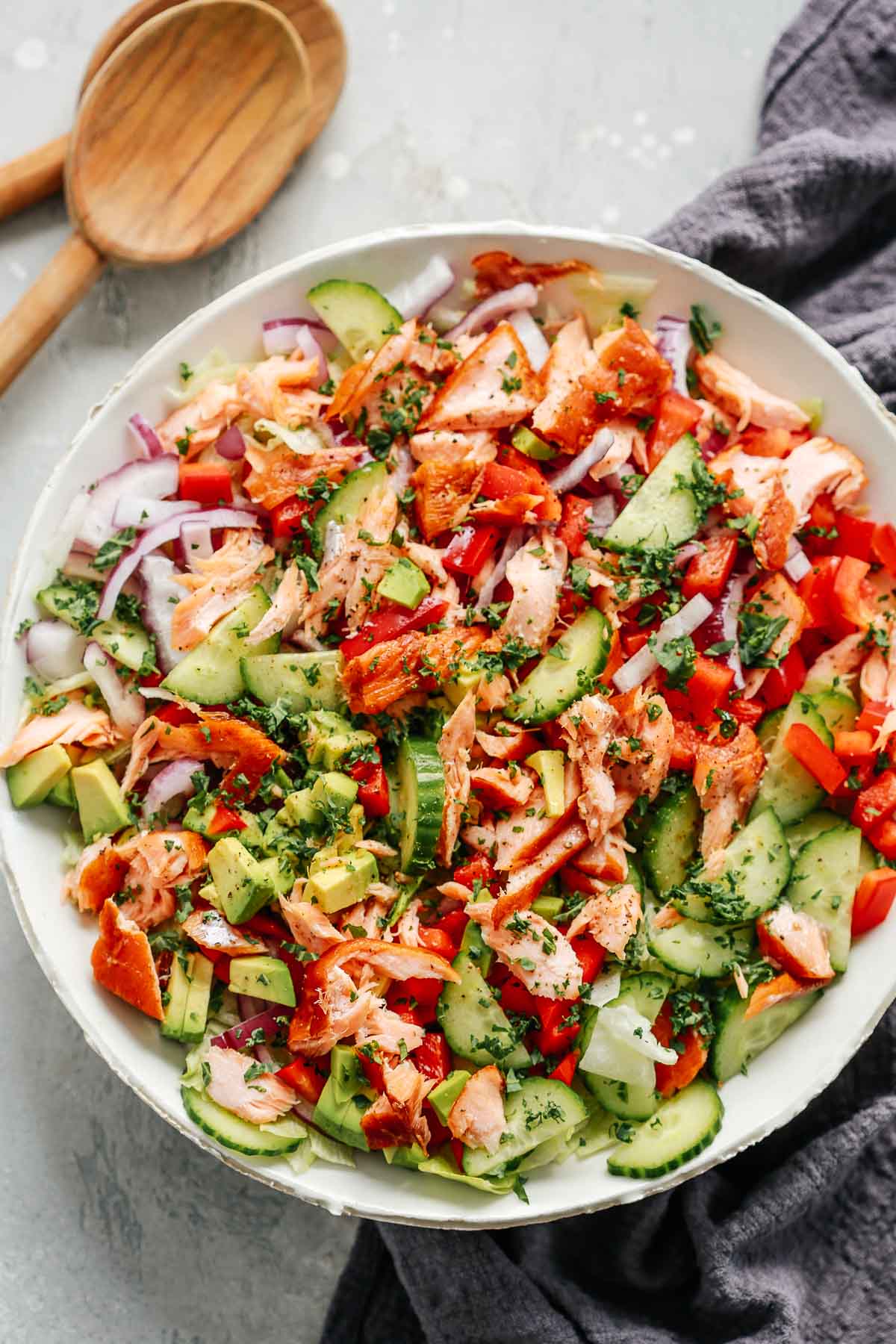 healthy chopped salmon salad in white bowl