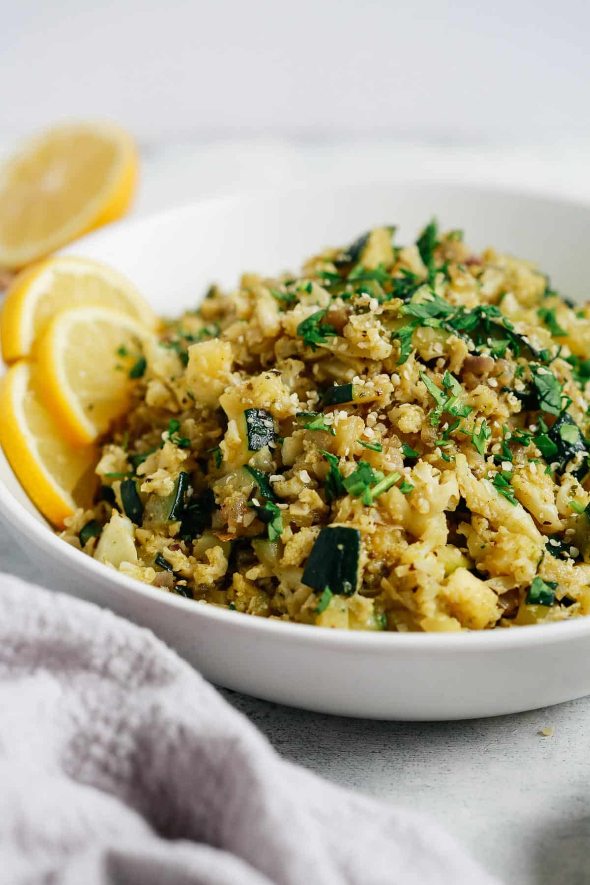 cauliflower rice in a white bowl