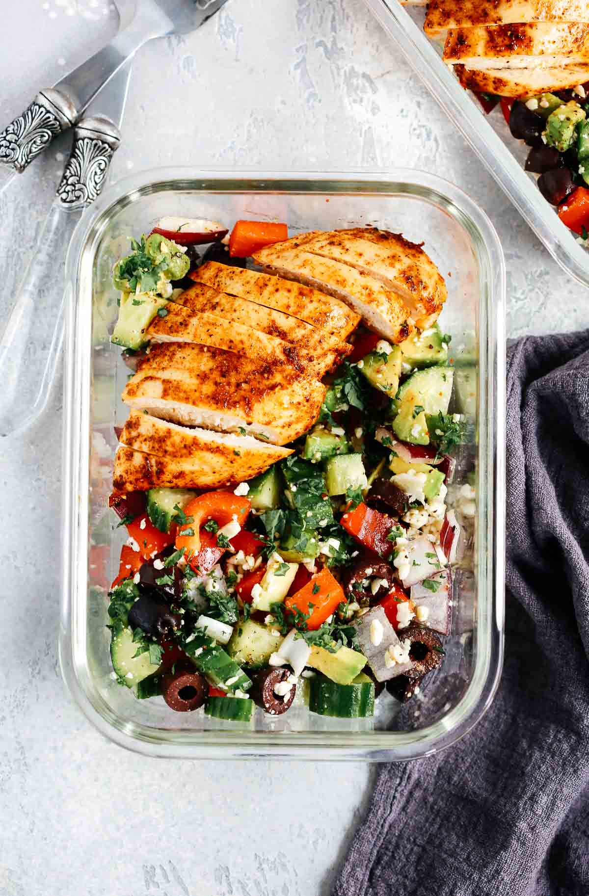 overhead view of Greek Chicken Salad in a glass bowls 