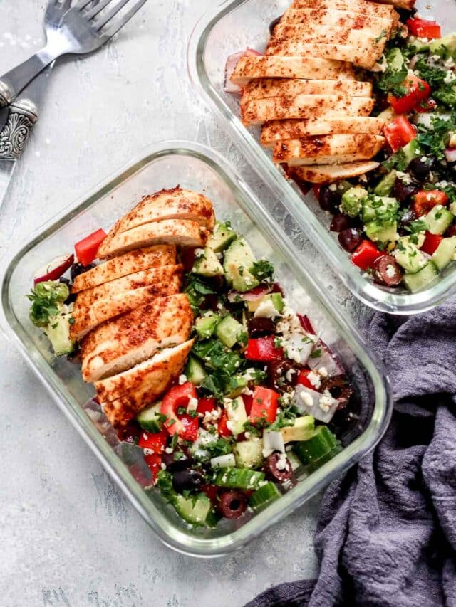 Greek Chicken Salad Bowls inside of two meal prep containers.