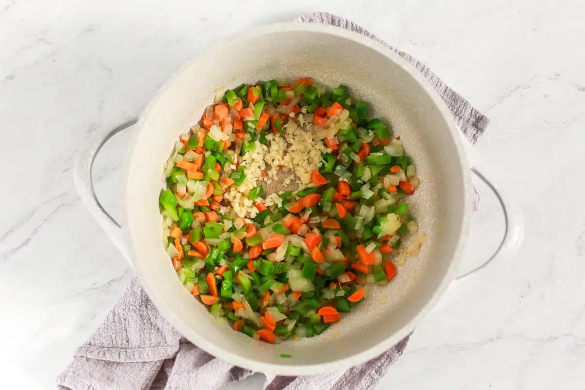 uncooked vegetables in a soup pot