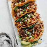 tray of slow cooker carnitas tacos