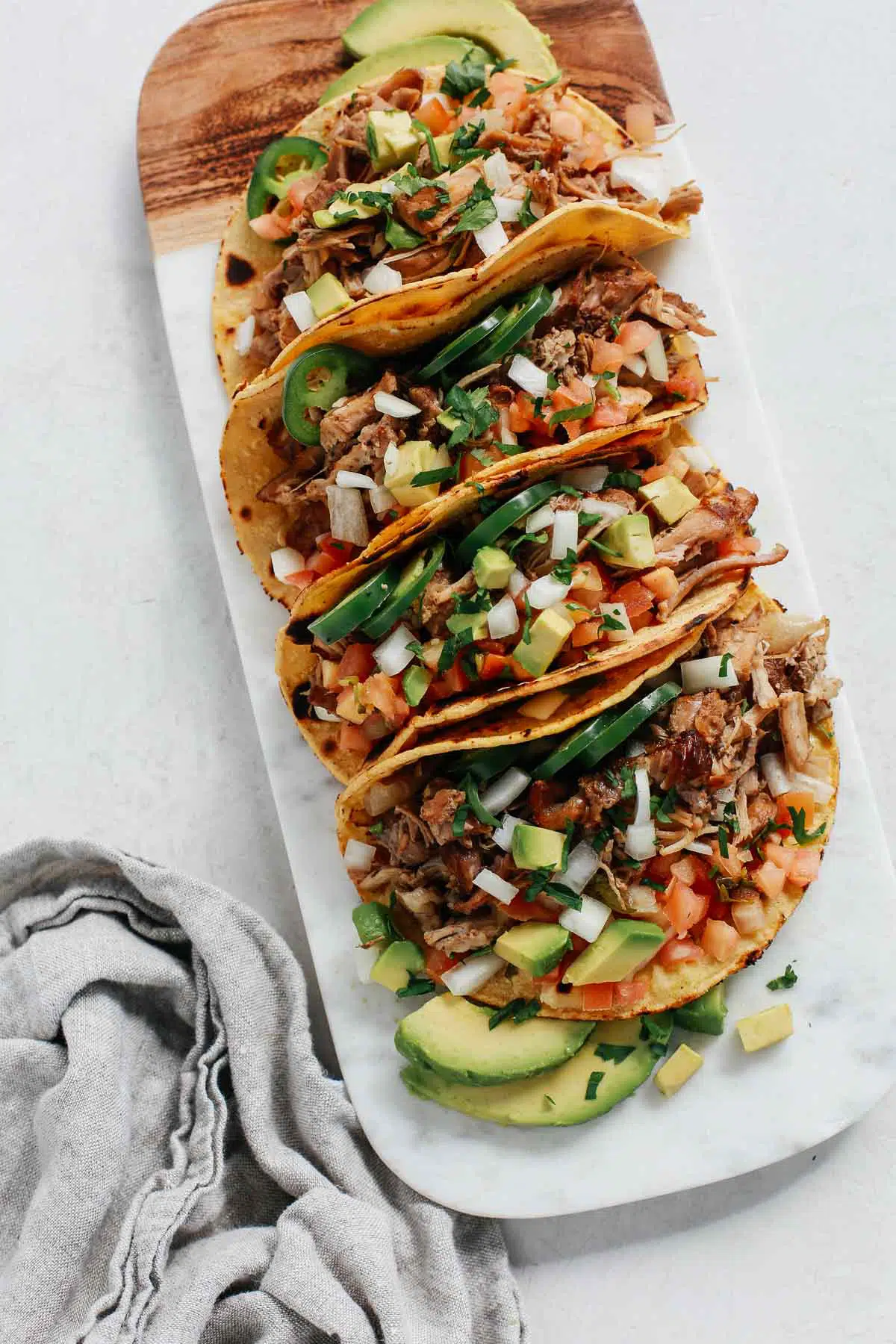 tray of slow cooker carnitas tacos