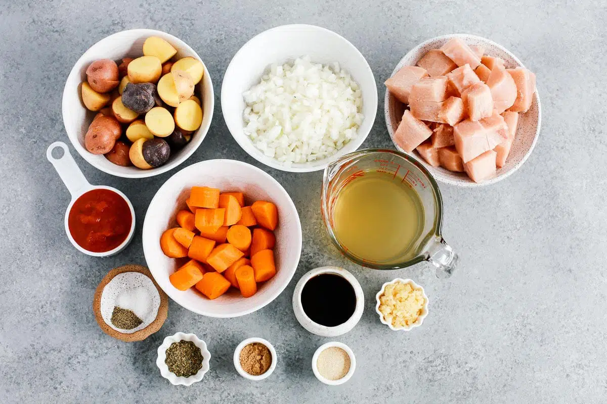 bowls of ingredients to make a chicken stew recipe