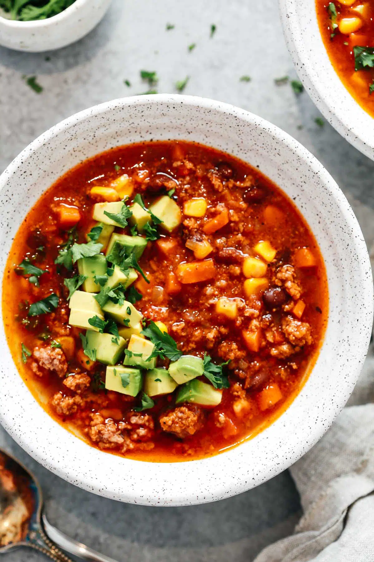 overhead view of Instant Pot taco soup in white bowl 
