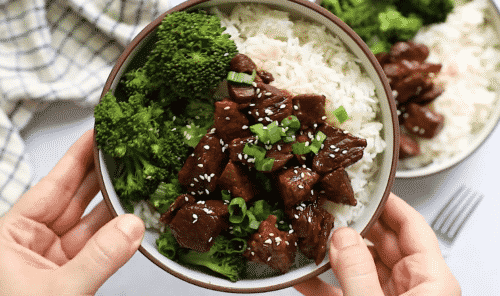 overhead view of Korean beef in a white bowl