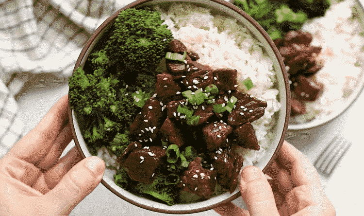 overhead view of Korean beef in a white bowl