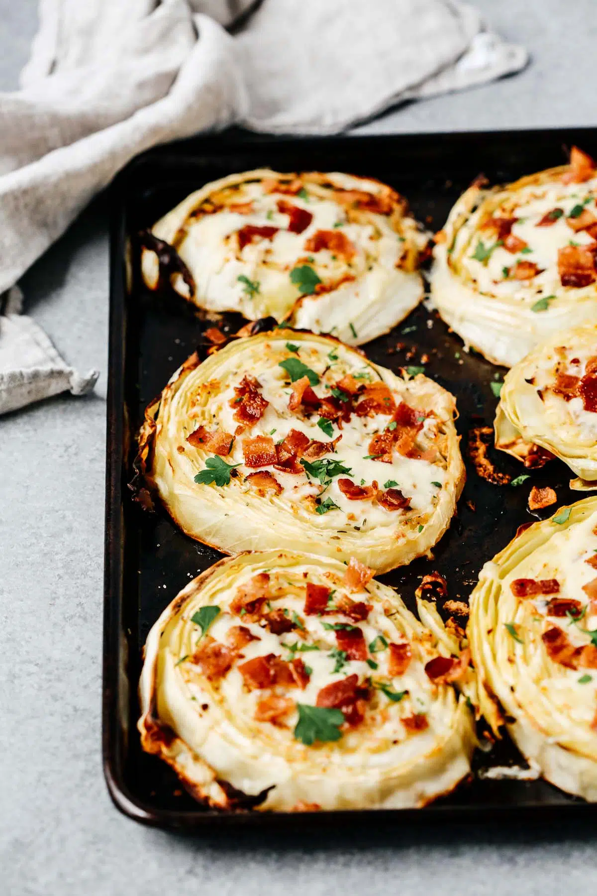 cabbage steaks with bacon and cheese
