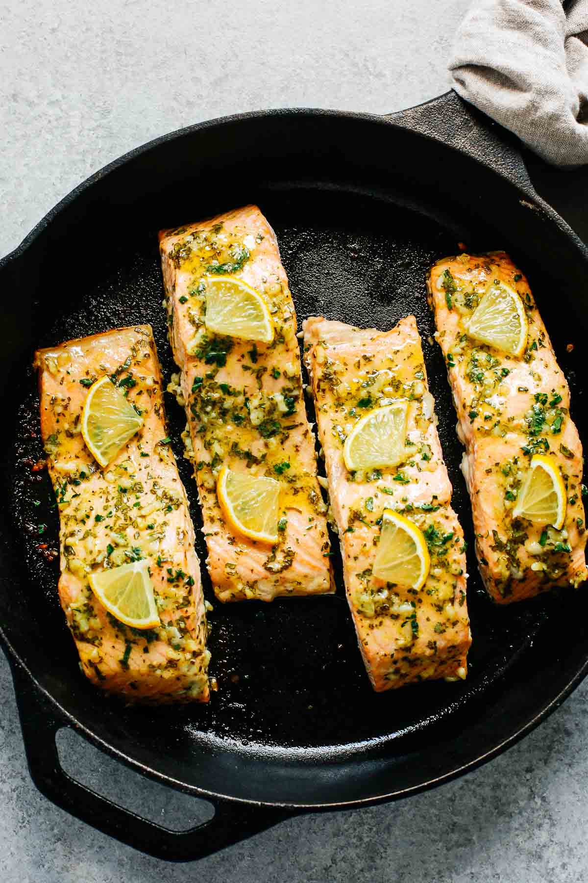 baked salmon with lemon in a cast iron skillet - gluten-free dinner recipes