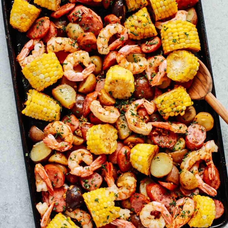 overhead photo of shrimp boil on a baking sheet