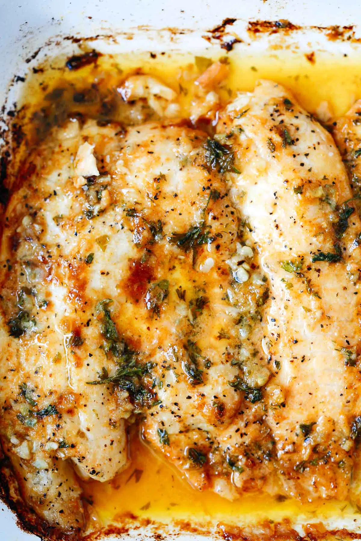 close up of garlic butter baked tilapia