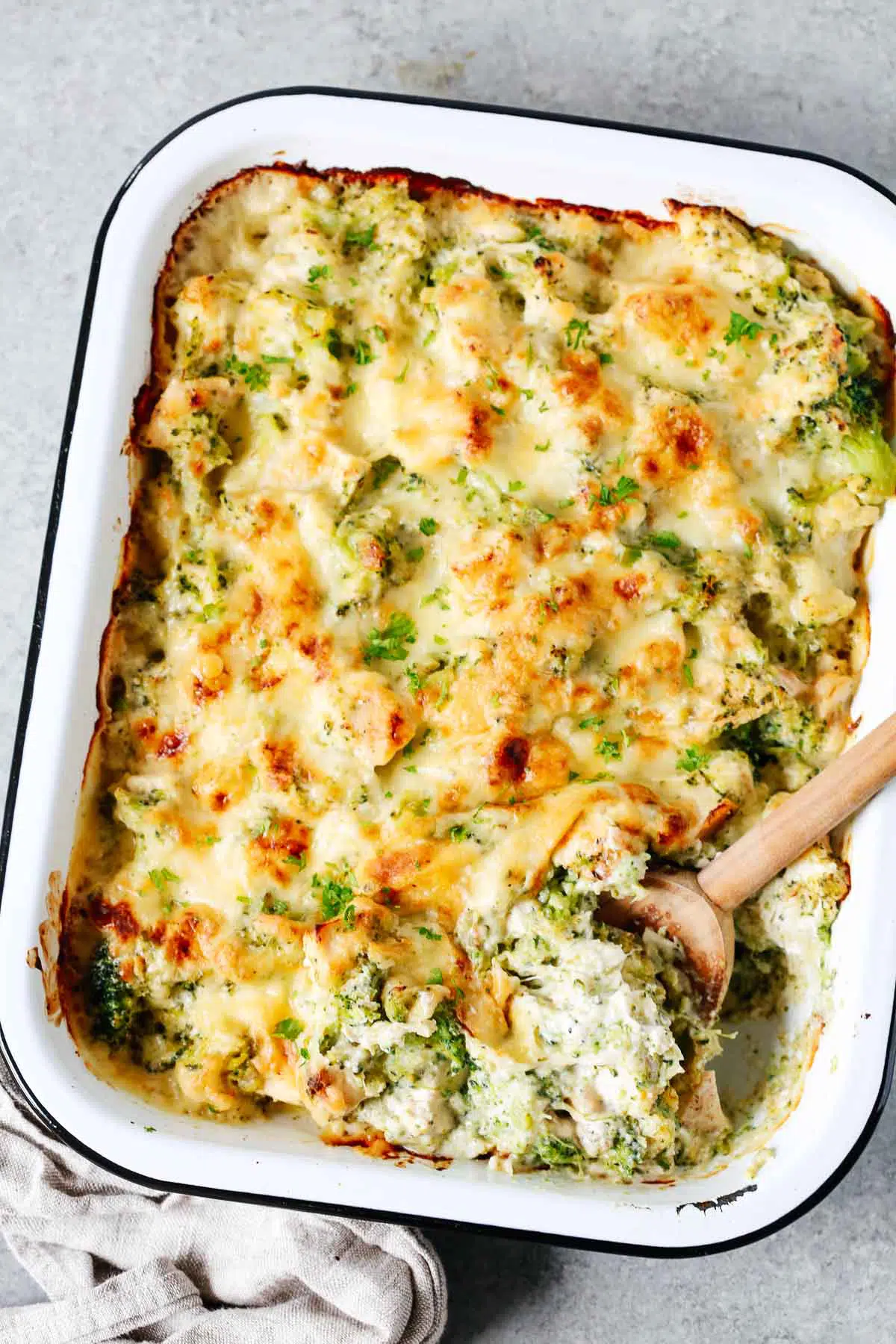 Overhead photo of a baking dish containing broccoli and cauliflower casserole.