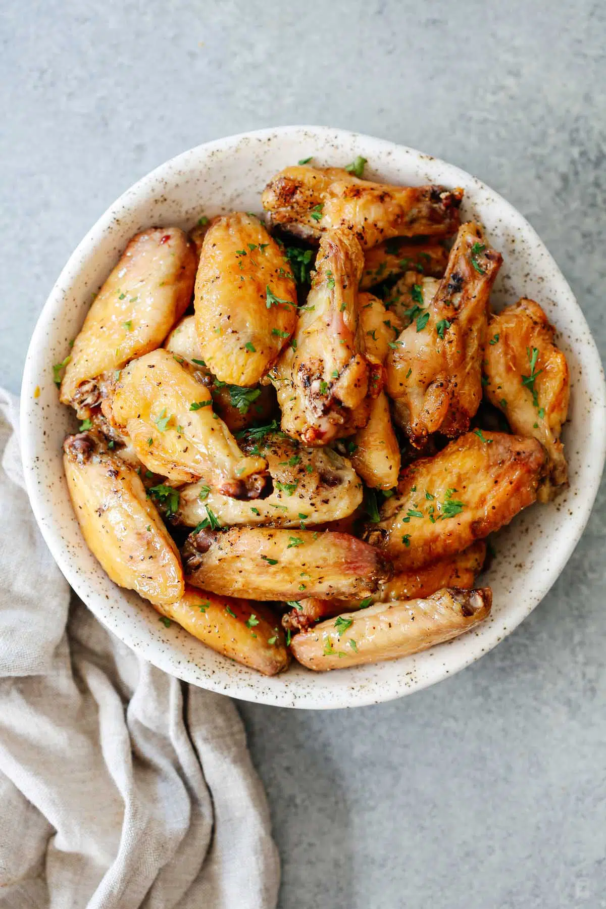 bowl filled with crispy baked chicken wings