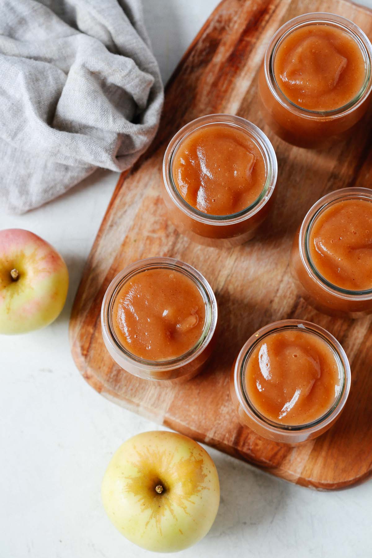 smooth slow cooker applesauce in five little jars