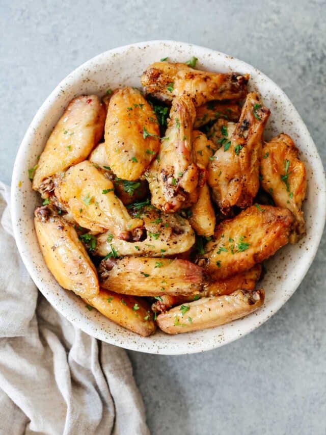 bowl filled with crispy baked chicken wings